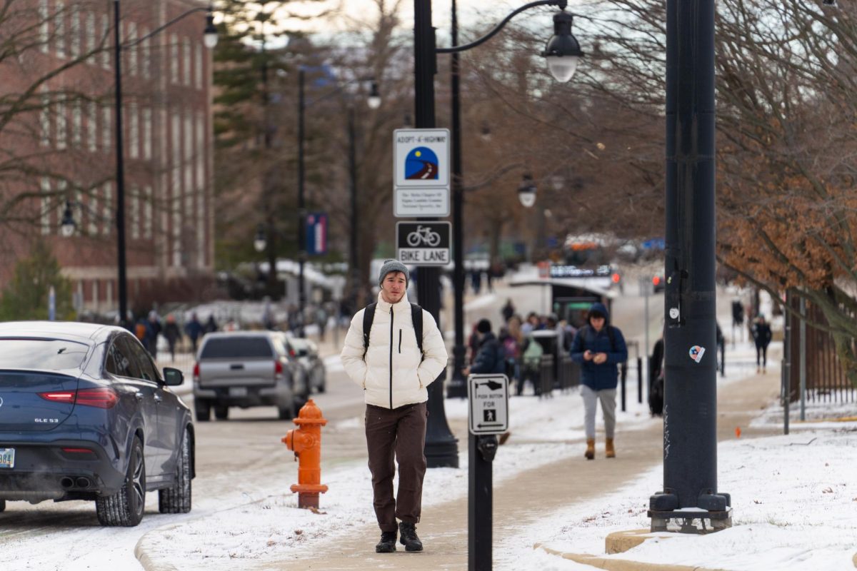 Students dress in layers to stay warm as they walk to class on Jan. 17. 