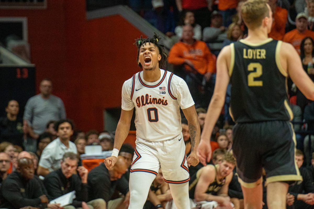 Fifth year guard #0 Terrence Shannon Jr. excitedly walking back to Illinois’ bench after Purdue calls a timeout during the Illinois vs. Purdue game, March.