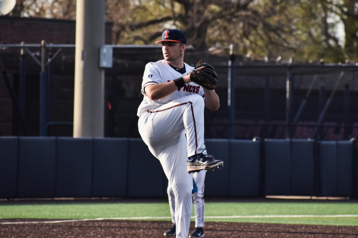 Freshman Pitcher Sam Reed throws a pitch out during a baseball game on April 9.