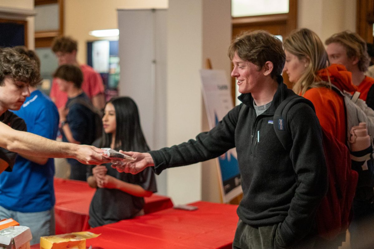 Ryan Roach, graduate student studying mathematics, gets a Dilly Bar from the pop-up Dairy Queen in Altgeld Hall on Monday.