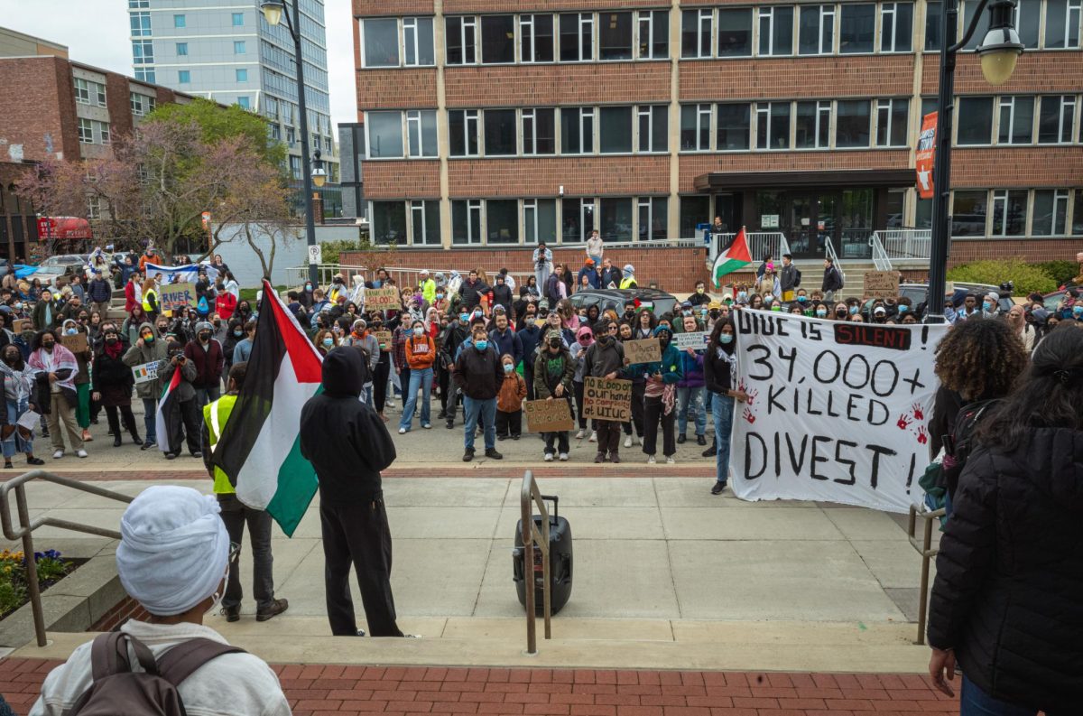 Protesters gather in front of the Swanlund Administration Building to demand change from the University Administration.