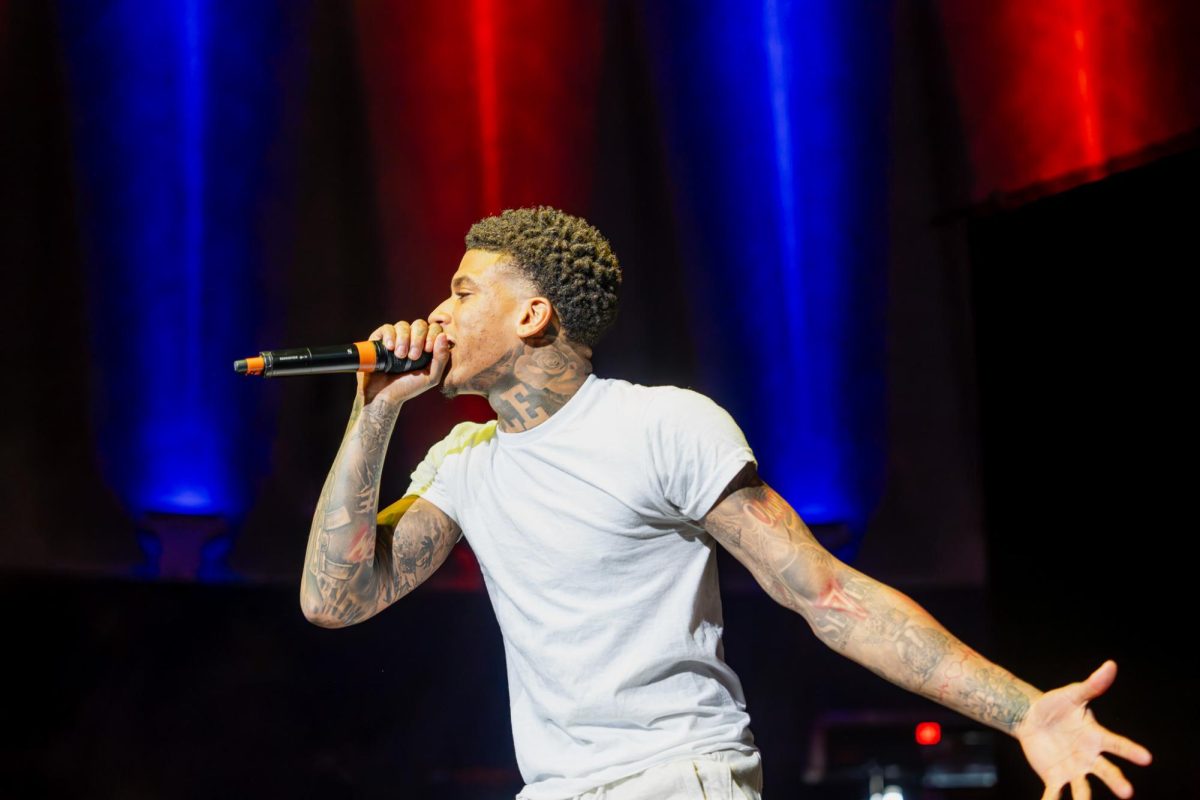 NLE Choppa performs energetically for Spring Jam 2024 in the State Farm Center on Sunday. The performance was delayed several hours due to travel issues.