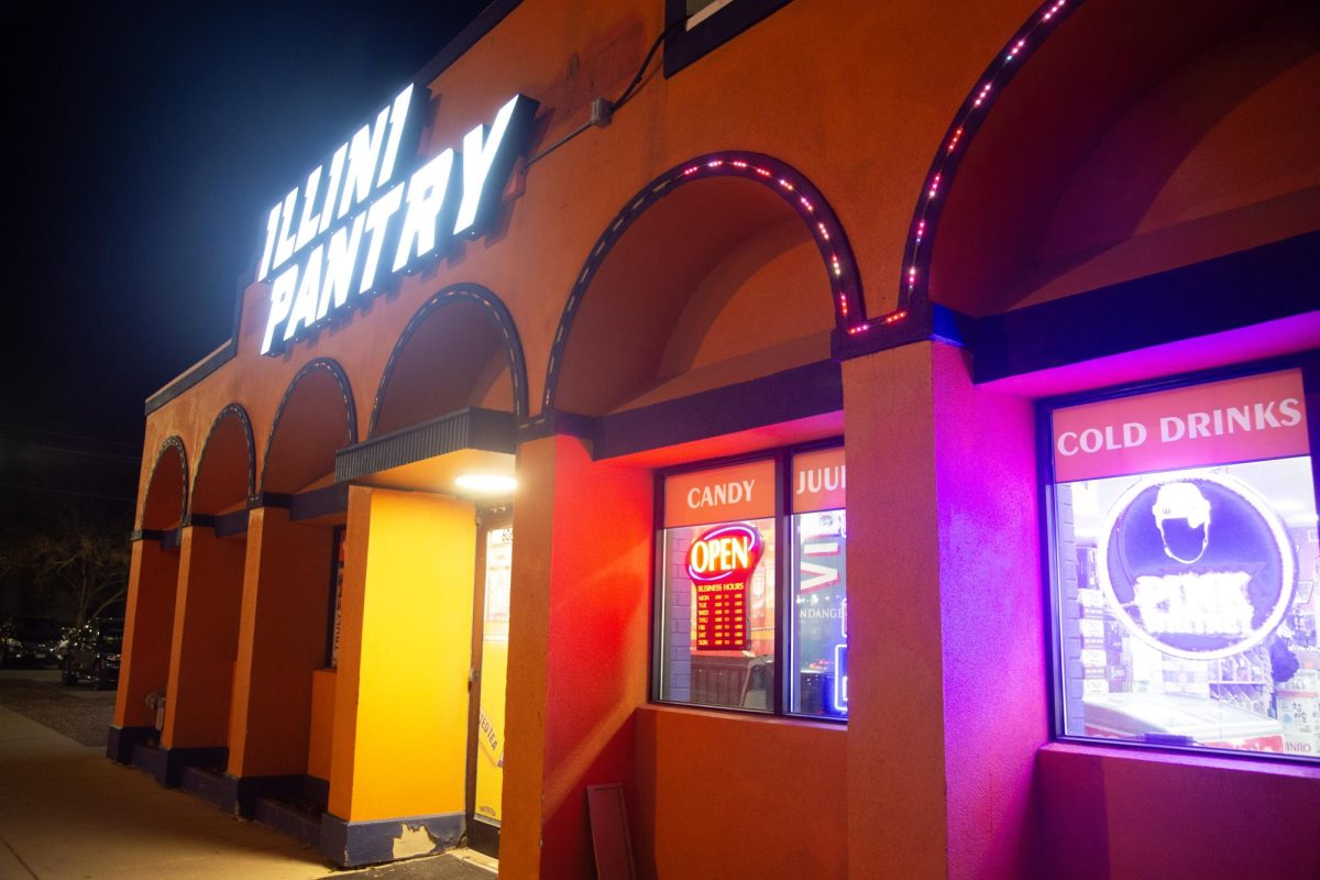 The Illini Pantry glows during the night on sixth street on March 23. 