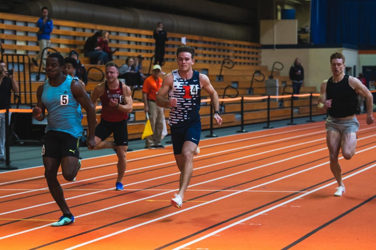 Senior Aiden Ouimet competes against Michigan during the 60 meter dash on Jan. 26.