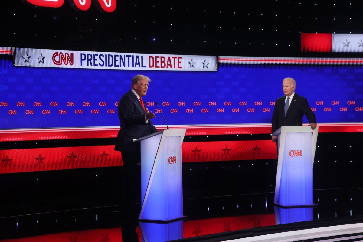 President Biden (right) and Former President Trump (left) stand on the debate stage Thursday night.