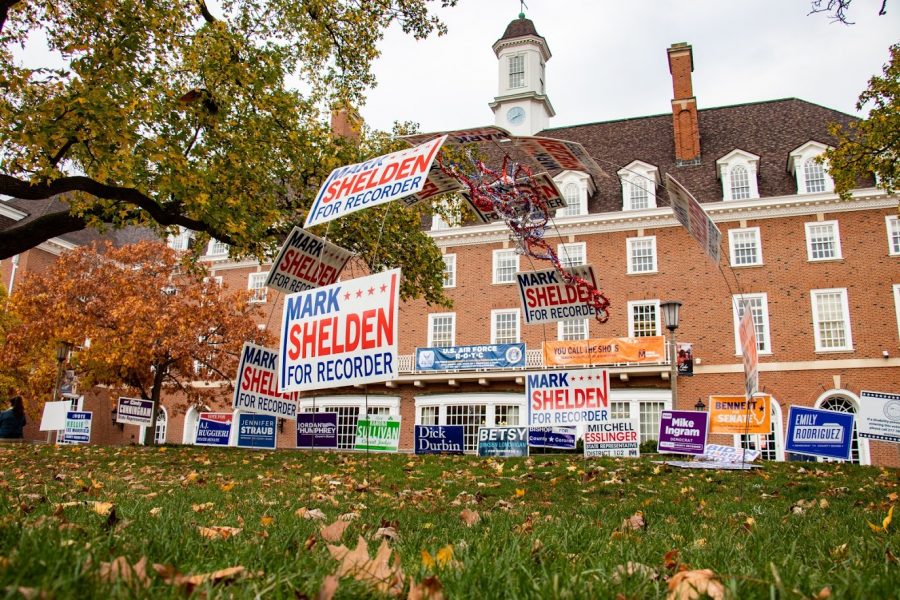 Lawn signs line the grass of the Main Quad outside of the Illini Union voting site on Thursday. Many important state positions are up for grabs in the 2020 Illinois election.