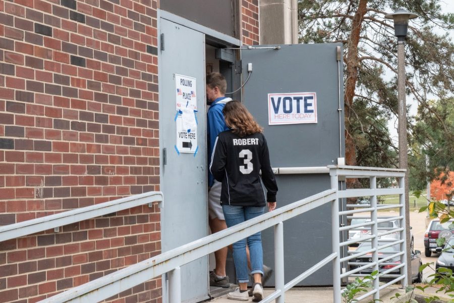 Voters enter the early voting location located in the ARC. Students share their views on the importance of the 2020 Presidential Election.