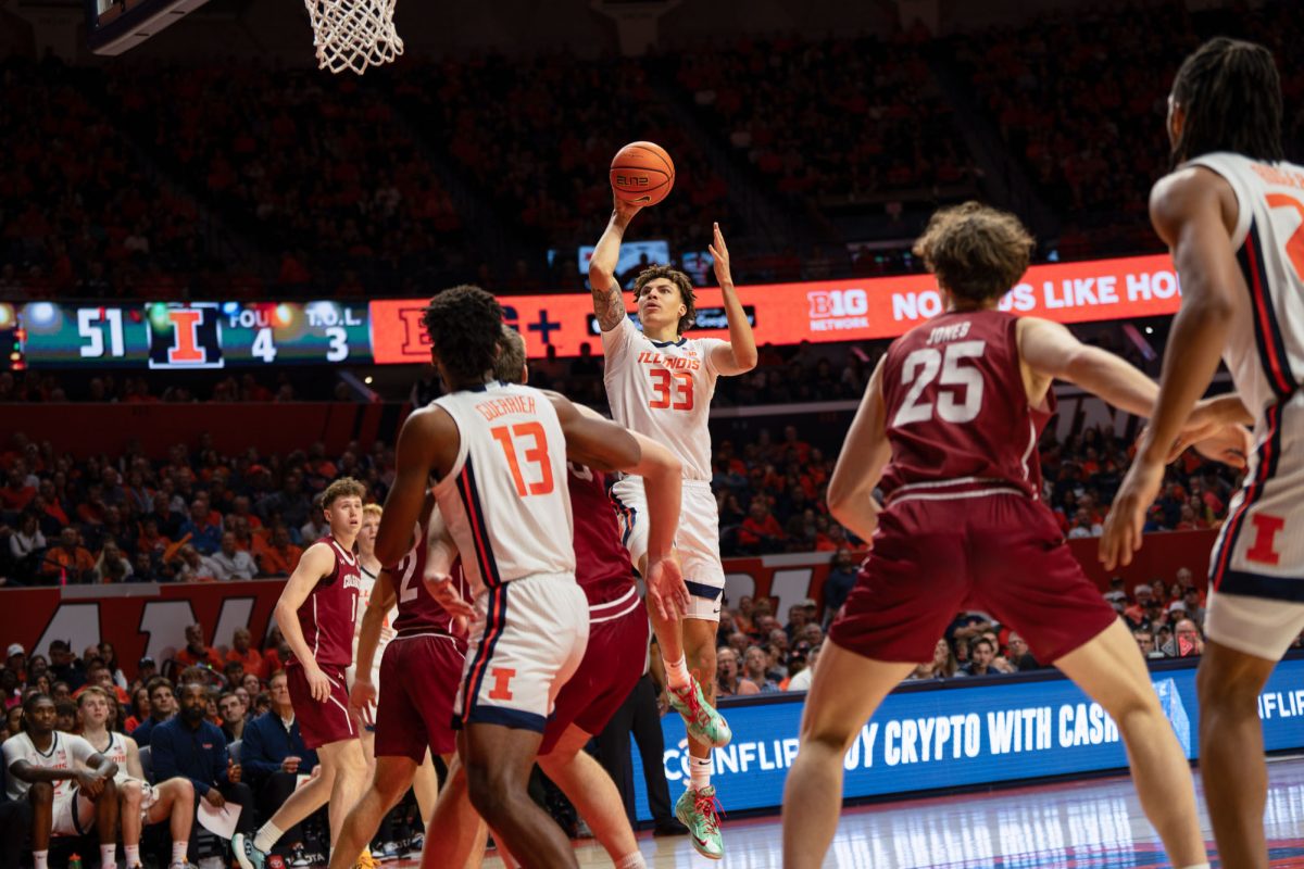 Senior Forward Coleman Hawkins prepares for a jump shot shortly after entering the game against Colgate on Sunday.