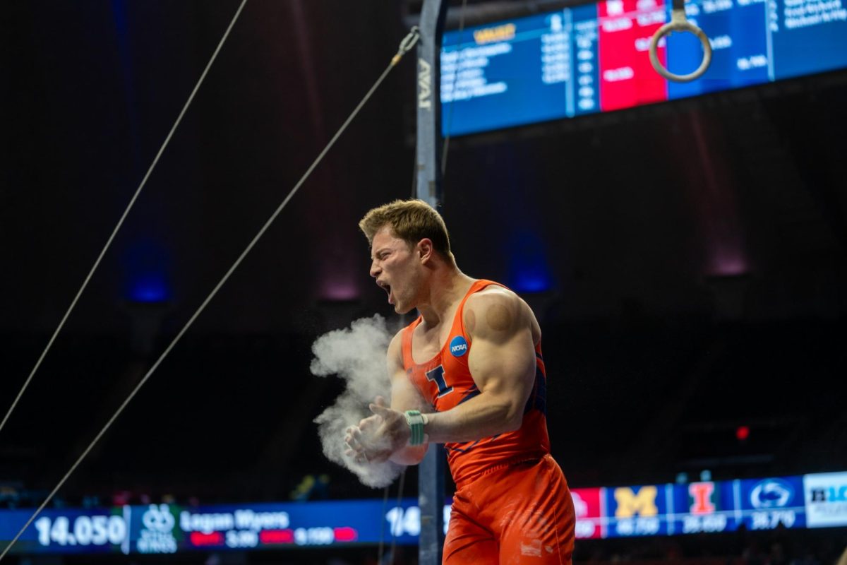 Ethan Boder celebrates after performing on the rings, he would recieve a score of 13.85.