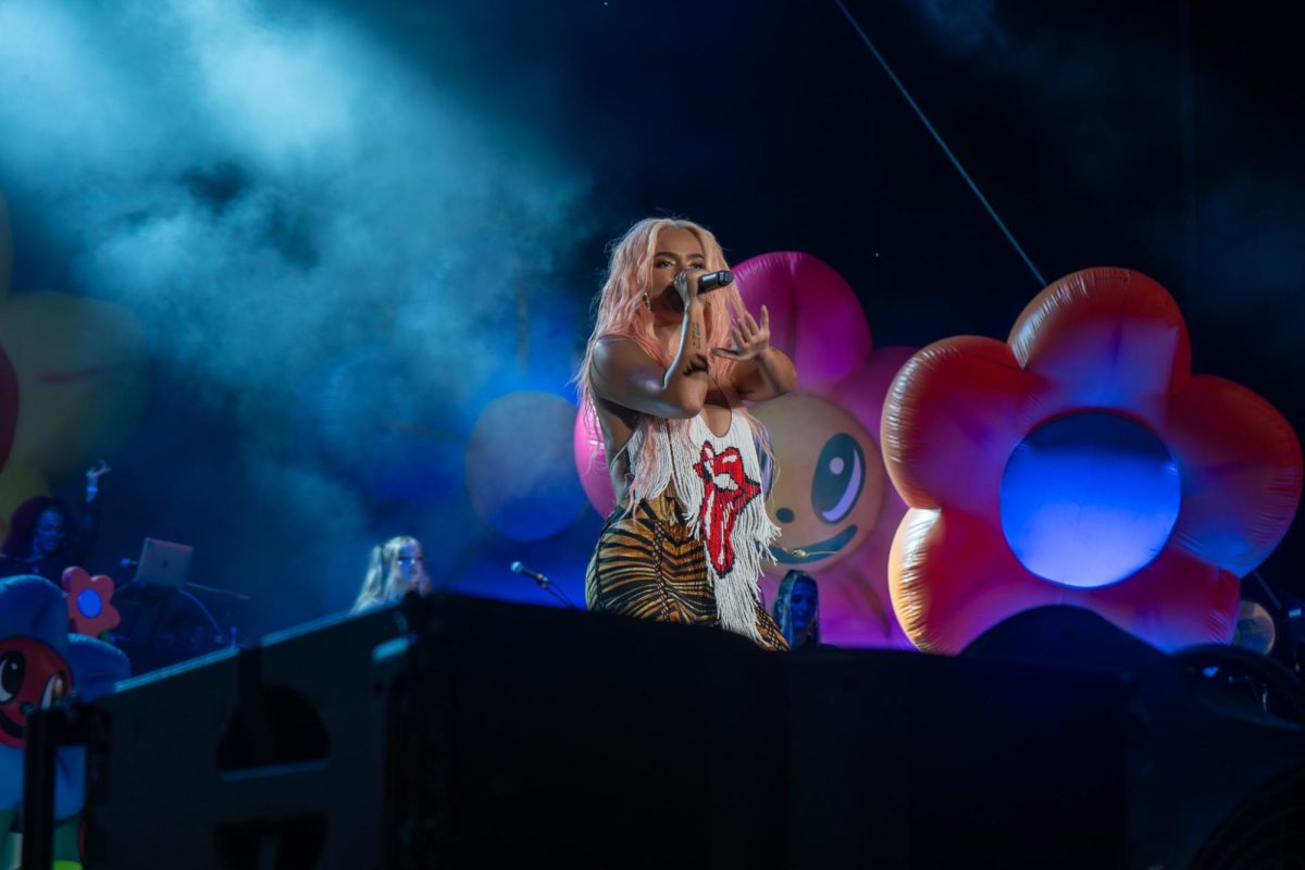 Colombian singer Karol G performs with a colorful set at Lollapalooza on Thursday.