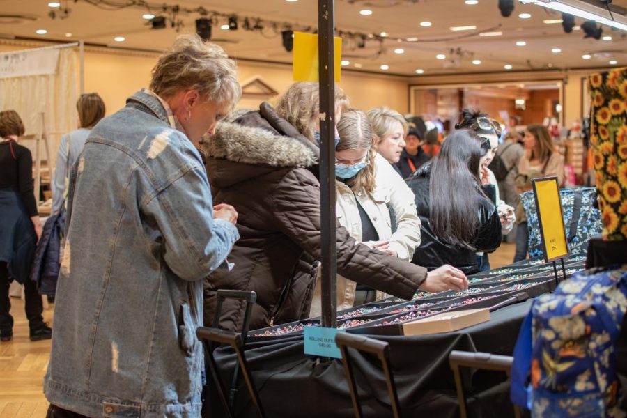 Visitors at last years craft and vendor fair, held by the Illini Union Board, look at jewelry for sale. The fair will return for this Moms Weekend from 10 a.m. to 4 p.m. on Saturday.