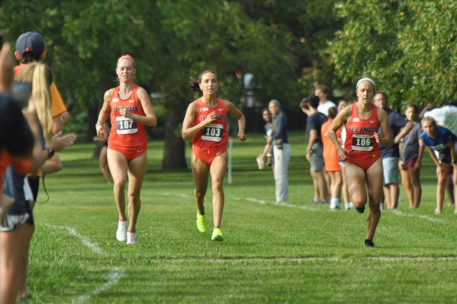 Illinois womens cross country runners Sam Poglitsch, Halle Hill and Madison Marasco heads towards the finish line as they finish up their 5k run at the Universitys Arboretum against Illinois State.