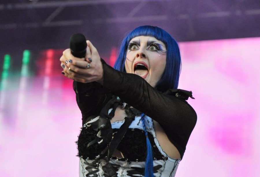 Ashnikko points the microphone towards the crowd at the Coinbase stage during her performance of her song “STUPID (feat. Yung Baby Tate) on Thursday. The first day of Lollapalooza featured 48 sets from artists with Metallica as Thursdays headliners. 