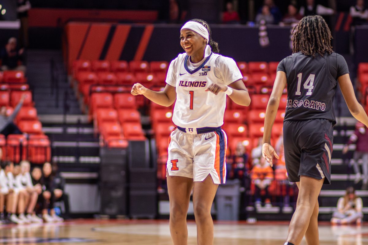 Senior Guard Genesis Bryant celebrates after assisting a teammates basket against Missouri in the fourth quarter on Thursday.