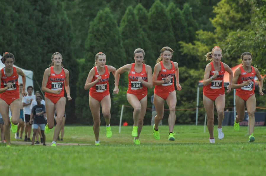 The Illinois womens cross country team takes off at the starting line for the womens 5k against Illinois State on Sept. 1. 