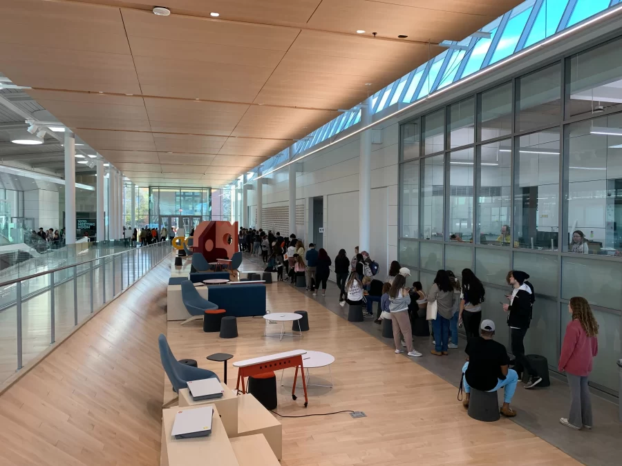 Voters wait in line at the Siebel Center for Design on Nov. 8 to participate in the polls.